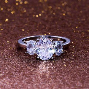 Three-Stone Oval Shaped Diamond Engagement Ring